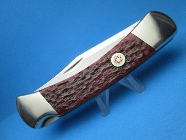 Custom Buck 110 Amber Jigged Bone Automatic Conversion Switchblade Knife