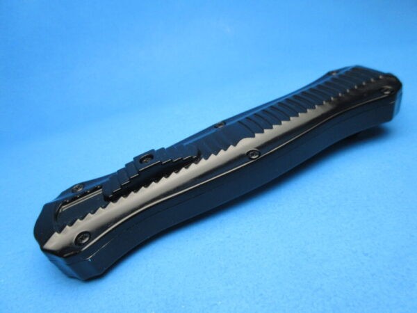 Silver Stinger Serrated OTF Switchblade