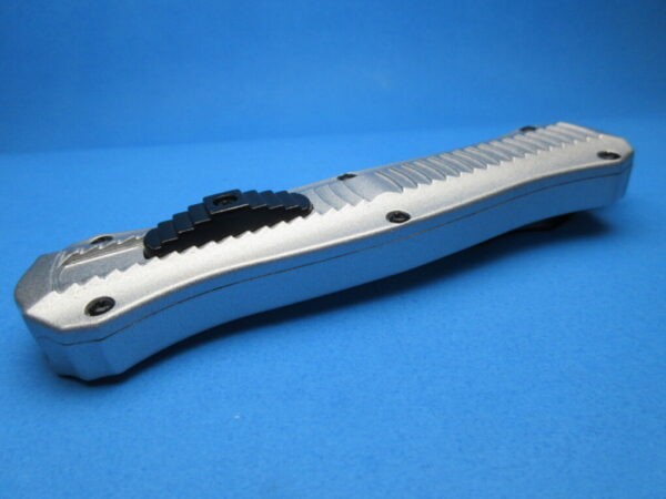Silver Stinger Serrated OTF Switchblade